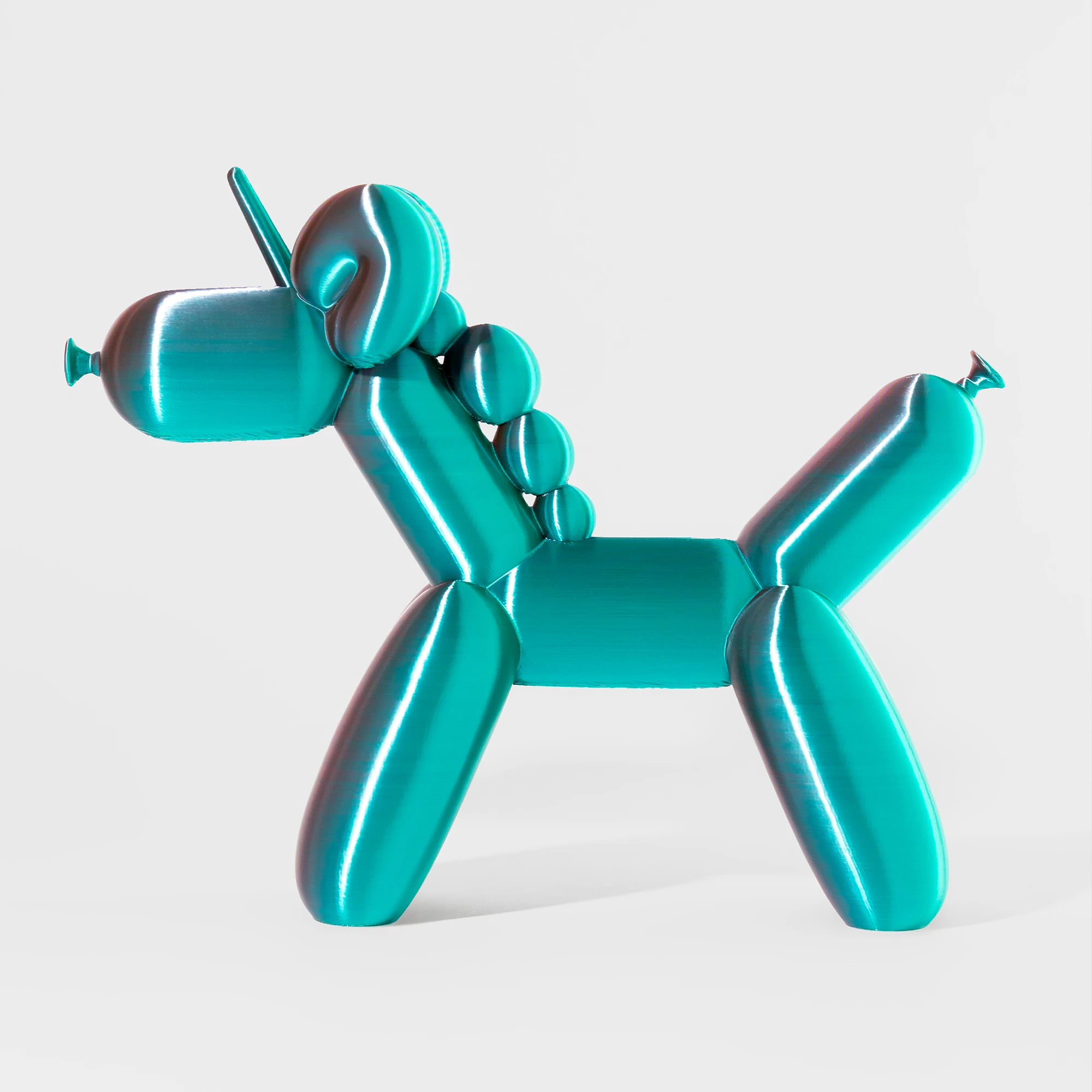 הדפסת תלת מימד של בלון בצורת חד קרן בגווני ורוד וכחול מבריק