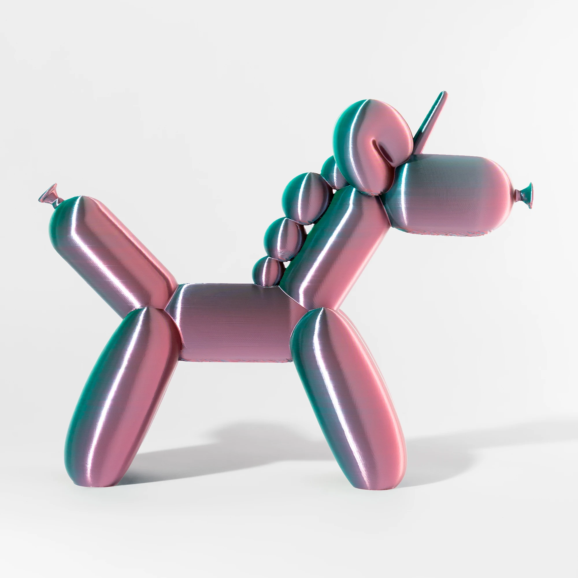 הדפסת תלת מימד של בלון בצורת חד קרן בגווני ורוד וכחול מבריק