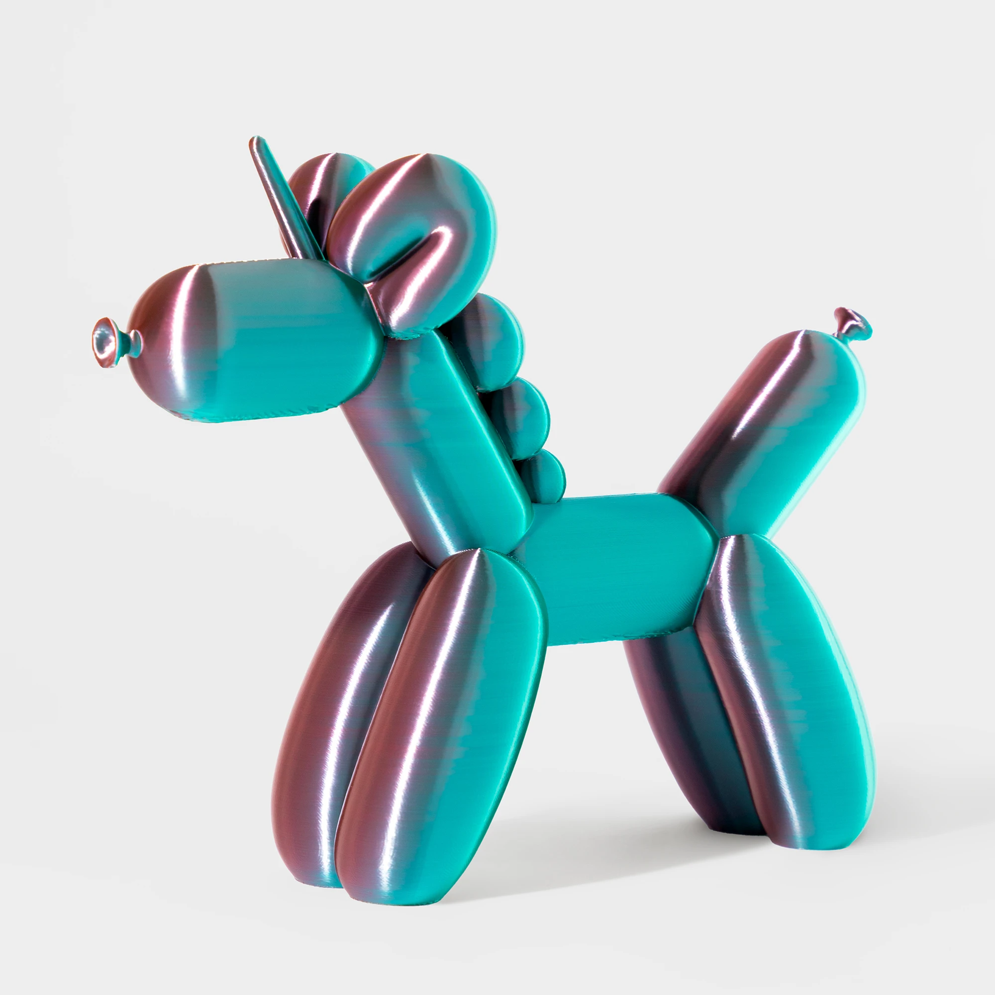 הדפסת תלת מימד של בלון בצורת חד קרן בגווני ורוד וכחול מבריק