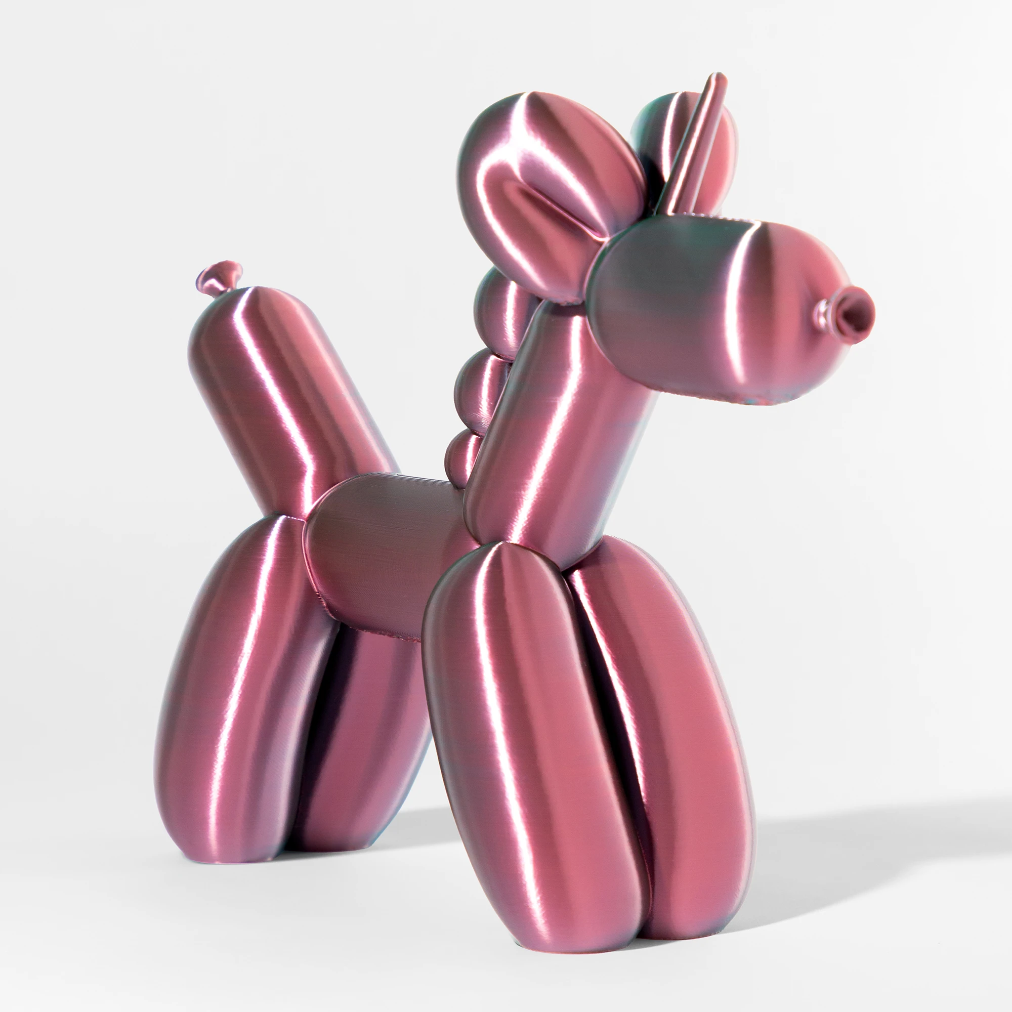 הדפסת תלת מימד של בלון בצורת חד קרן בגווני ורוד וכחול מבריק