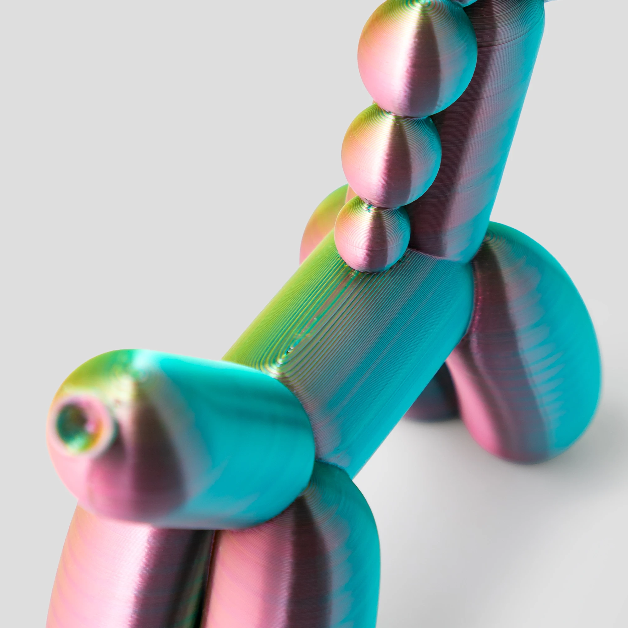 הדפסת תלת מימד של בלון בצורת חד קרן בגווני טריקולור