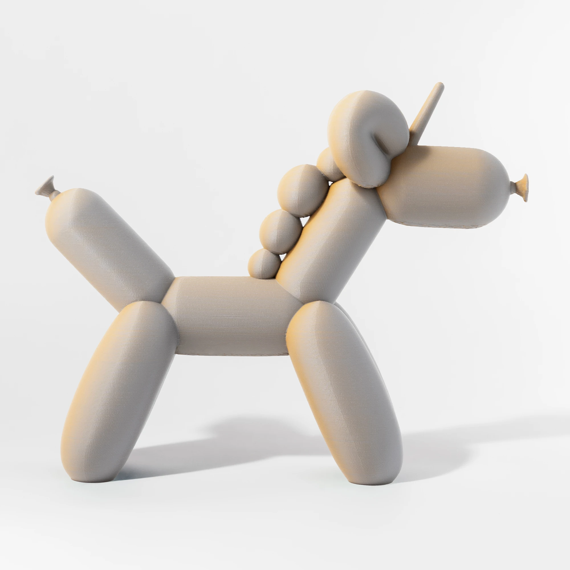 הדפסת תלת מימד של בלון בצורת חד קרן בגווני אפור-טרקוטה