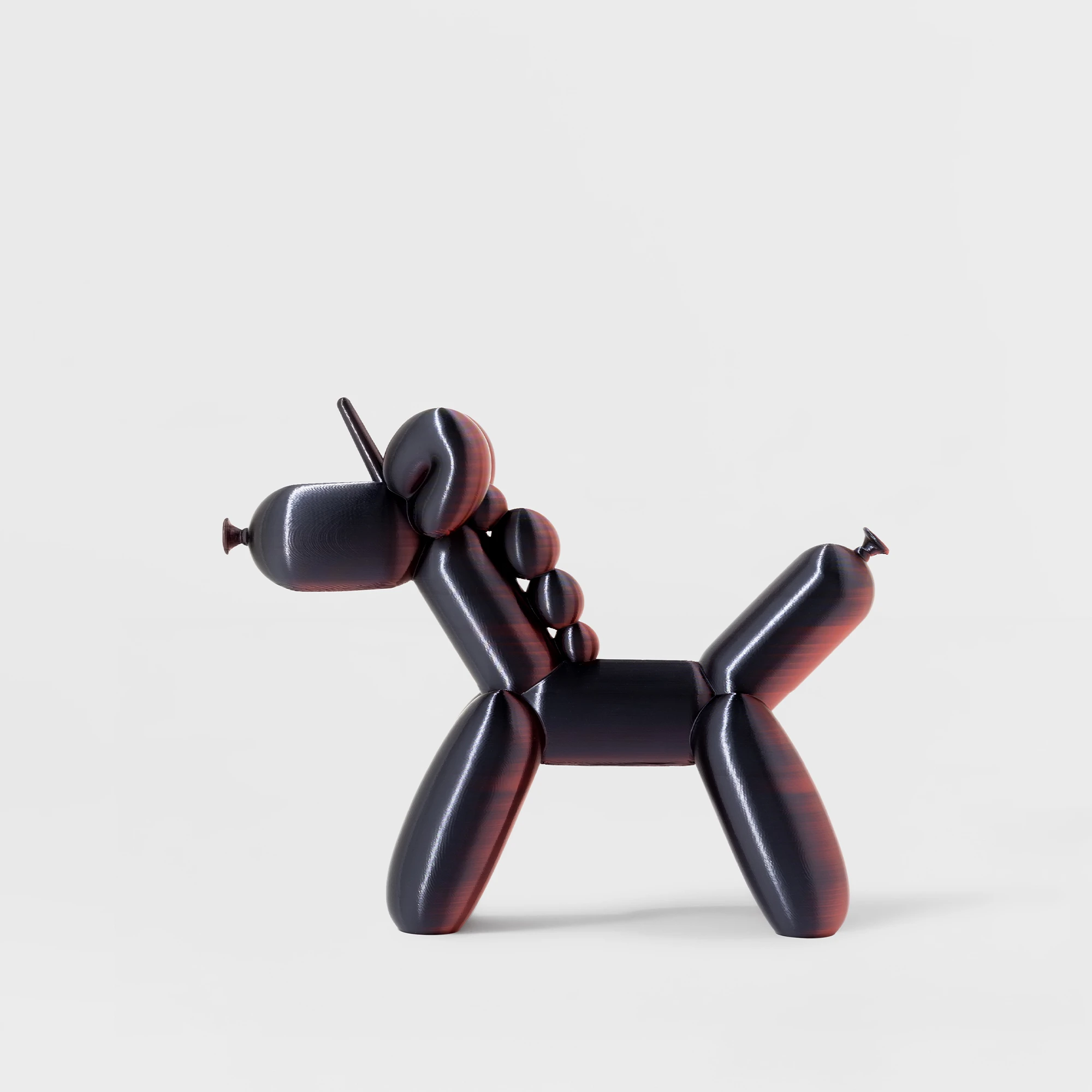 הדפסת תלת מימד של בלון בצורת חד קרן בצבע שחור-אדום