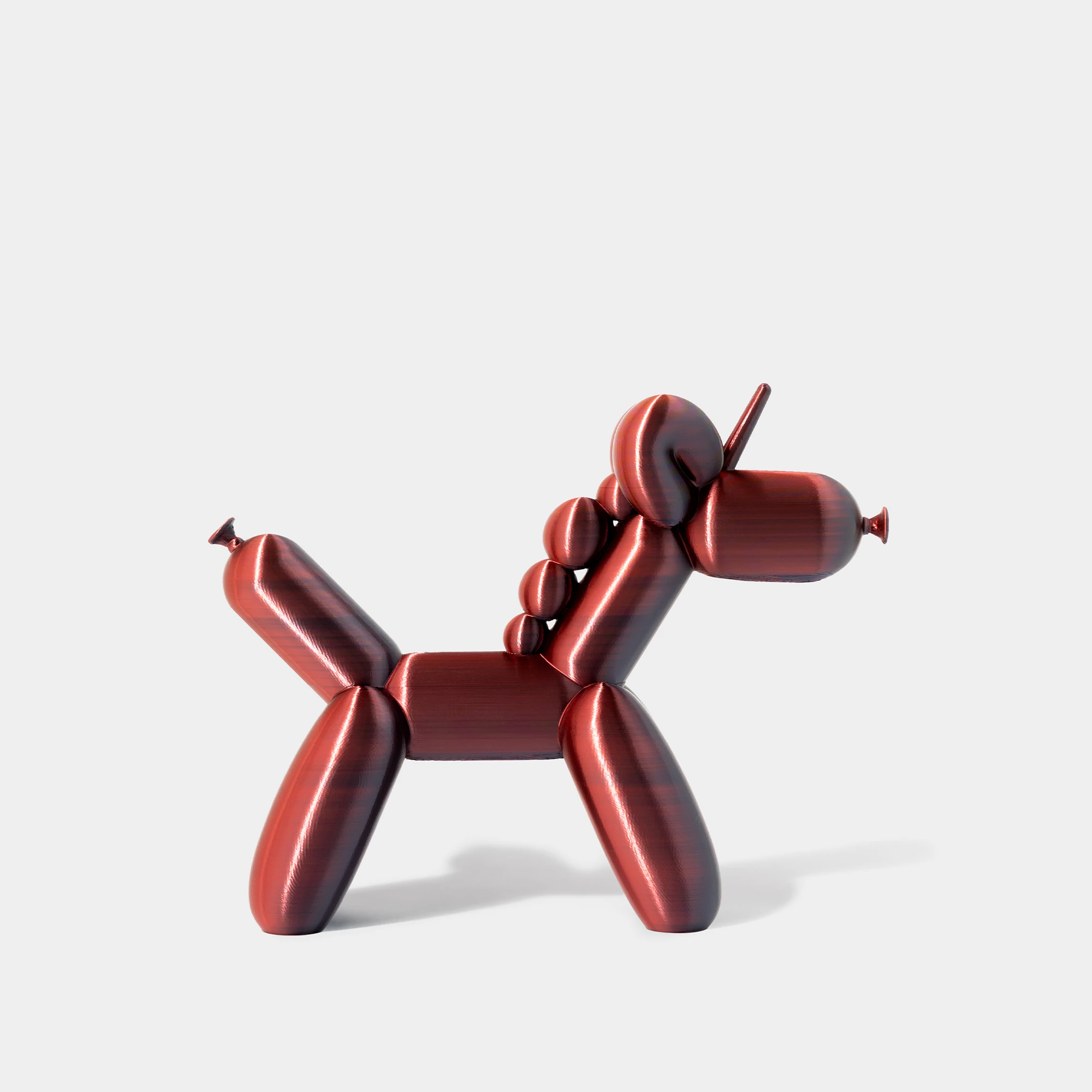 הדפסת תלת מימד של בלון בצורת חד קרן בצבע אדום-שחור