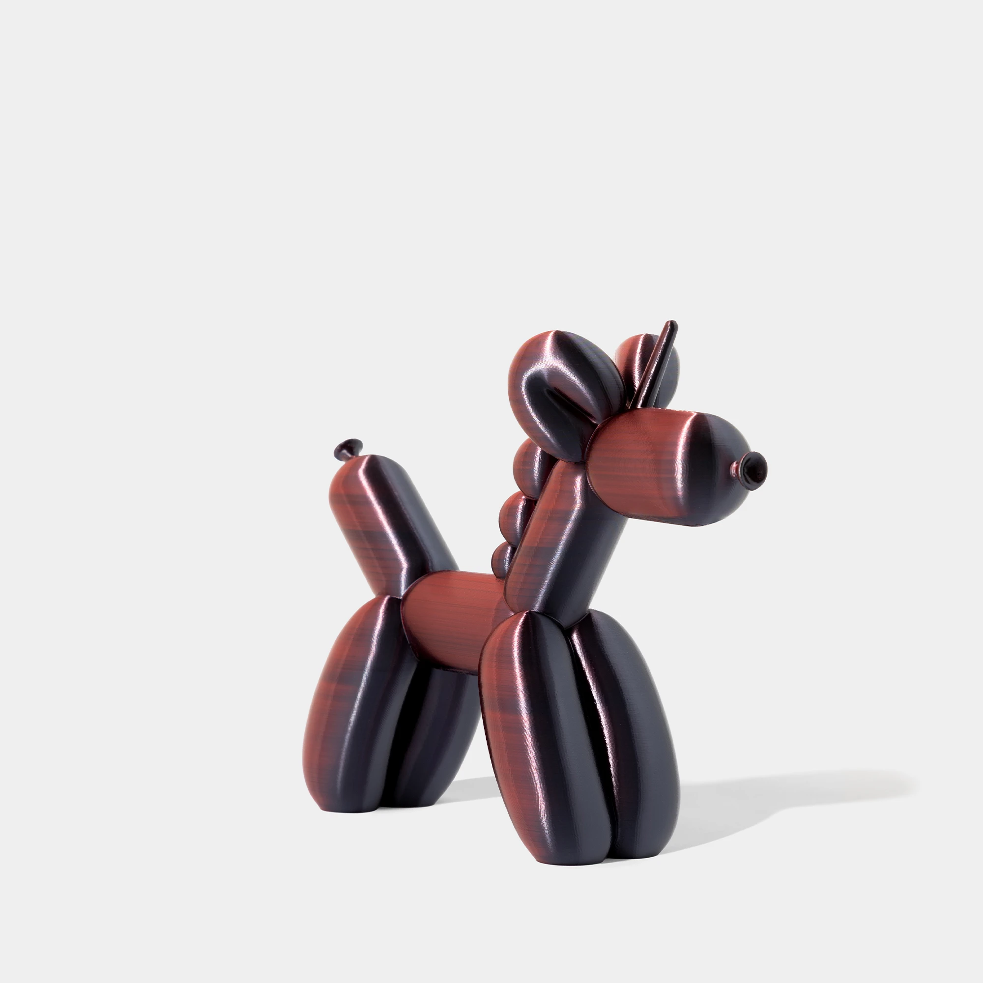 הדפסת תלת מימד של בלון בצורת חד קרן בצבע שחור-אדום