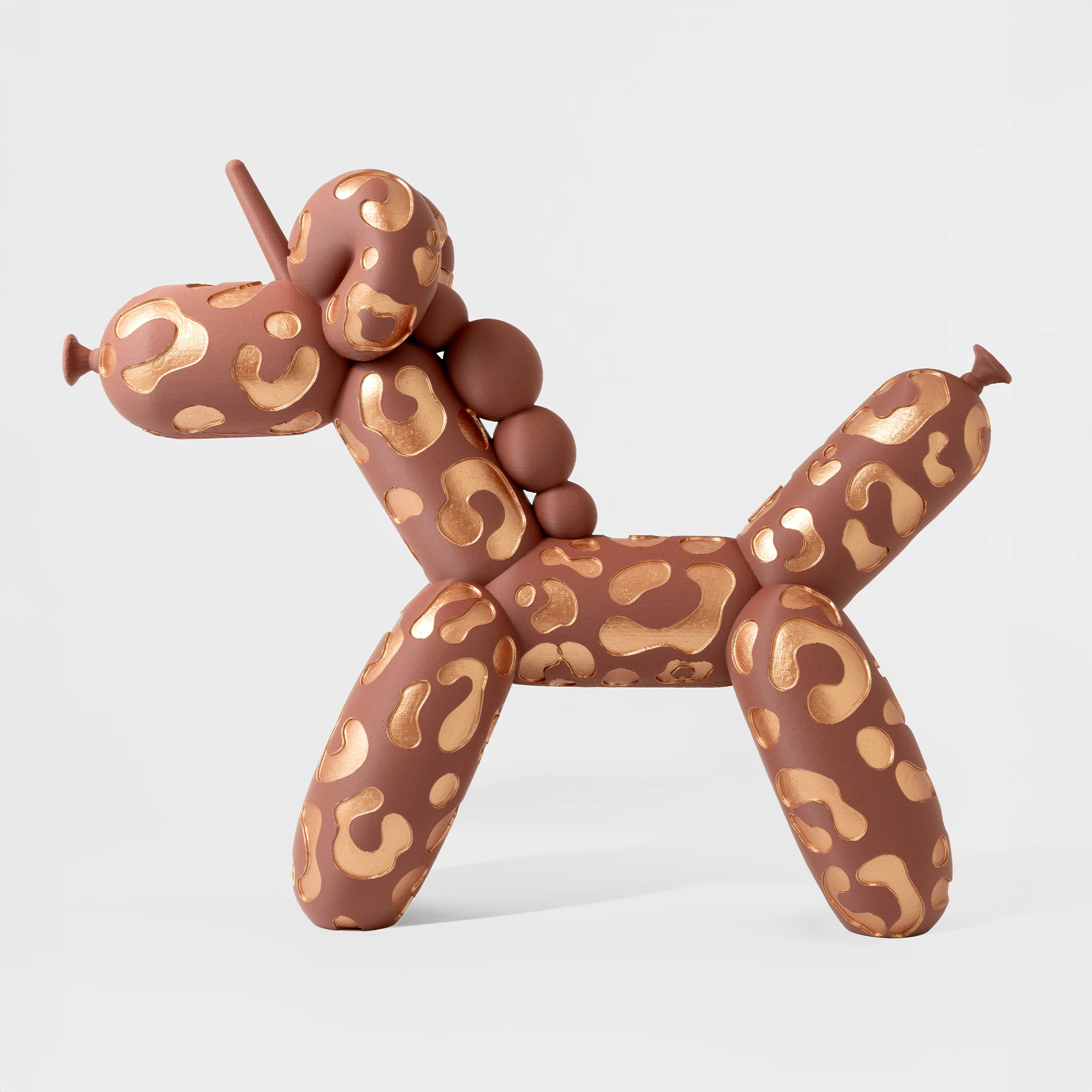 הדפסת תלת מימד של בלון בצורת חד קרן בצבע בורדו אבן וברונזה מנומר