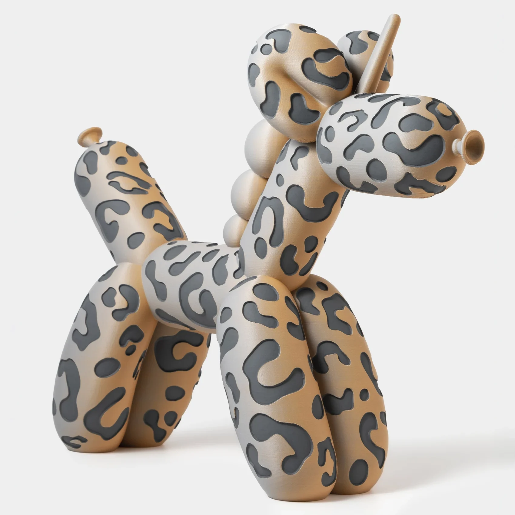 הדפסת תלת מימד של בלון בצורת חד קרן בצבע אפור וטרקוטה מנומר