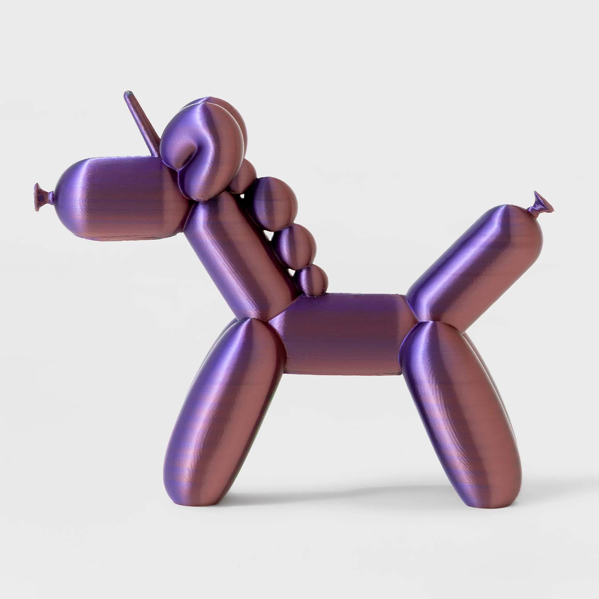 הדפסת תלת מימד של בלון בצורת חד קרן מחליף צבעים חום-סגול-ירוק